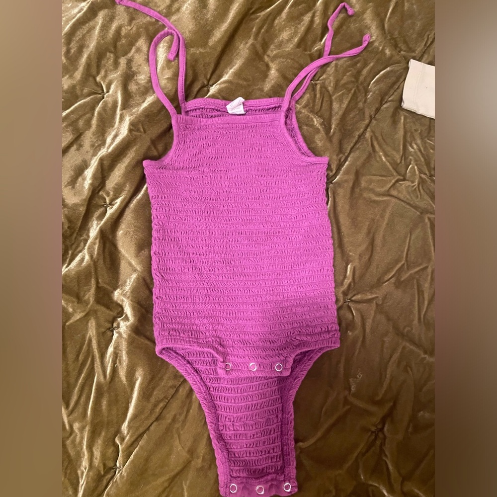 kate quinn ruffled onesie